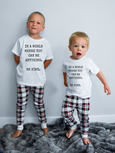 In A World Where You Can Be Anything, Be Kind - Kid's + Toddler Onesies and Tees